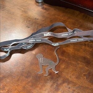 Hermès Paris Ribbon with Leather Monkey Cutout